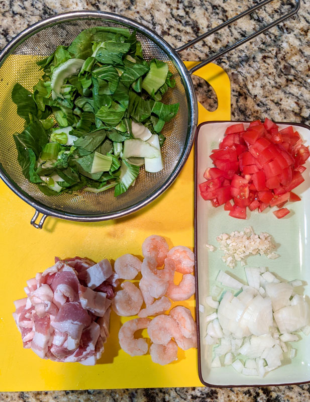 Munggo Ingredients: Bok Choy, tomatoes, garlic, onions, bacon and shrimp